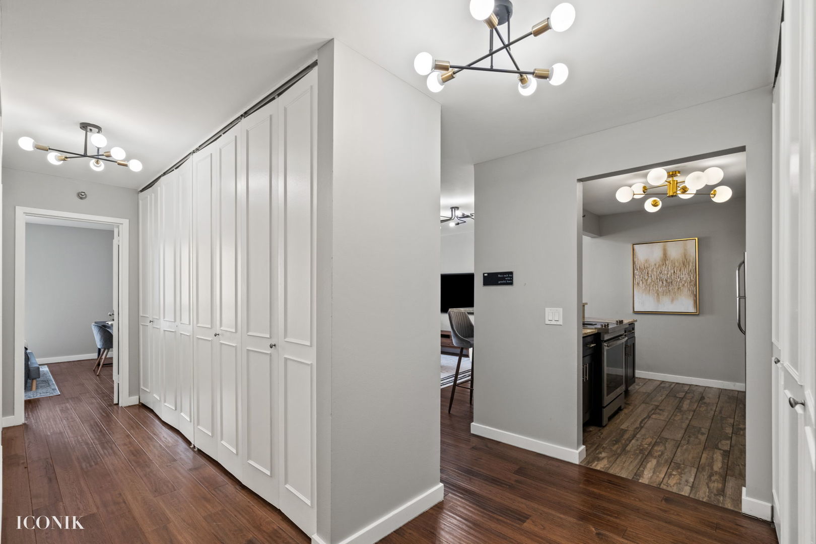 200 North Dearborn Street, Unit 1007 Chicago, IL 60601 - Photo 10 of 18 a view of a hallway with wooden floor and staircase
