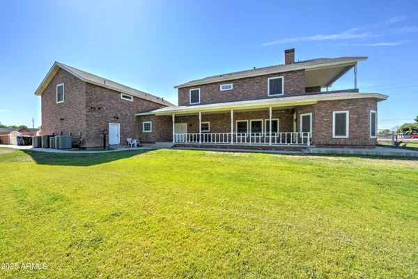 a front view of a house with swimming pool