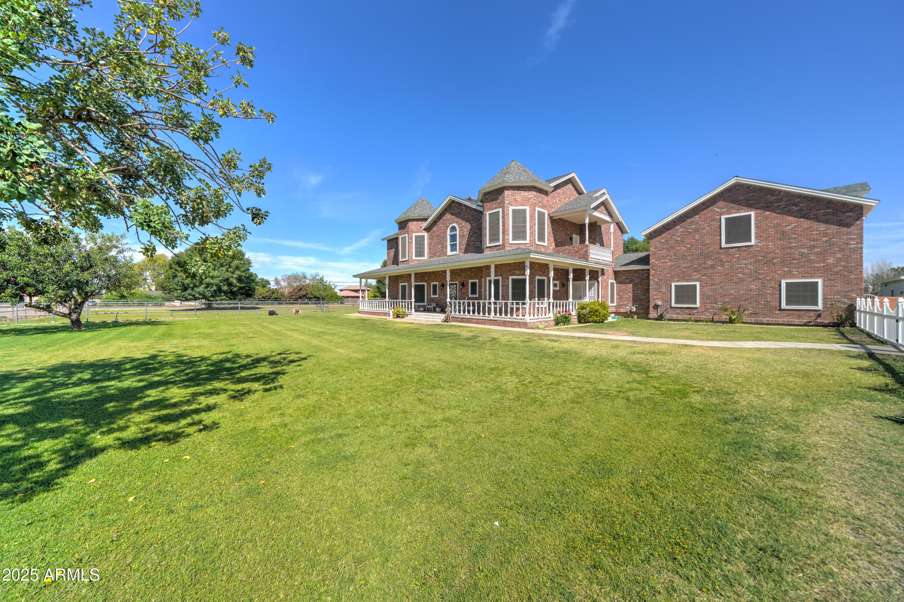 424 East Lehi Road Mesa, AZ 85203 - Photo 35 of 35 a front view of a house with a big yard