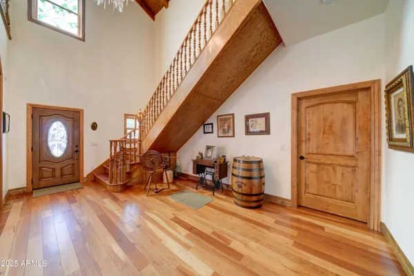 a view of a livingroom with furniture and a window