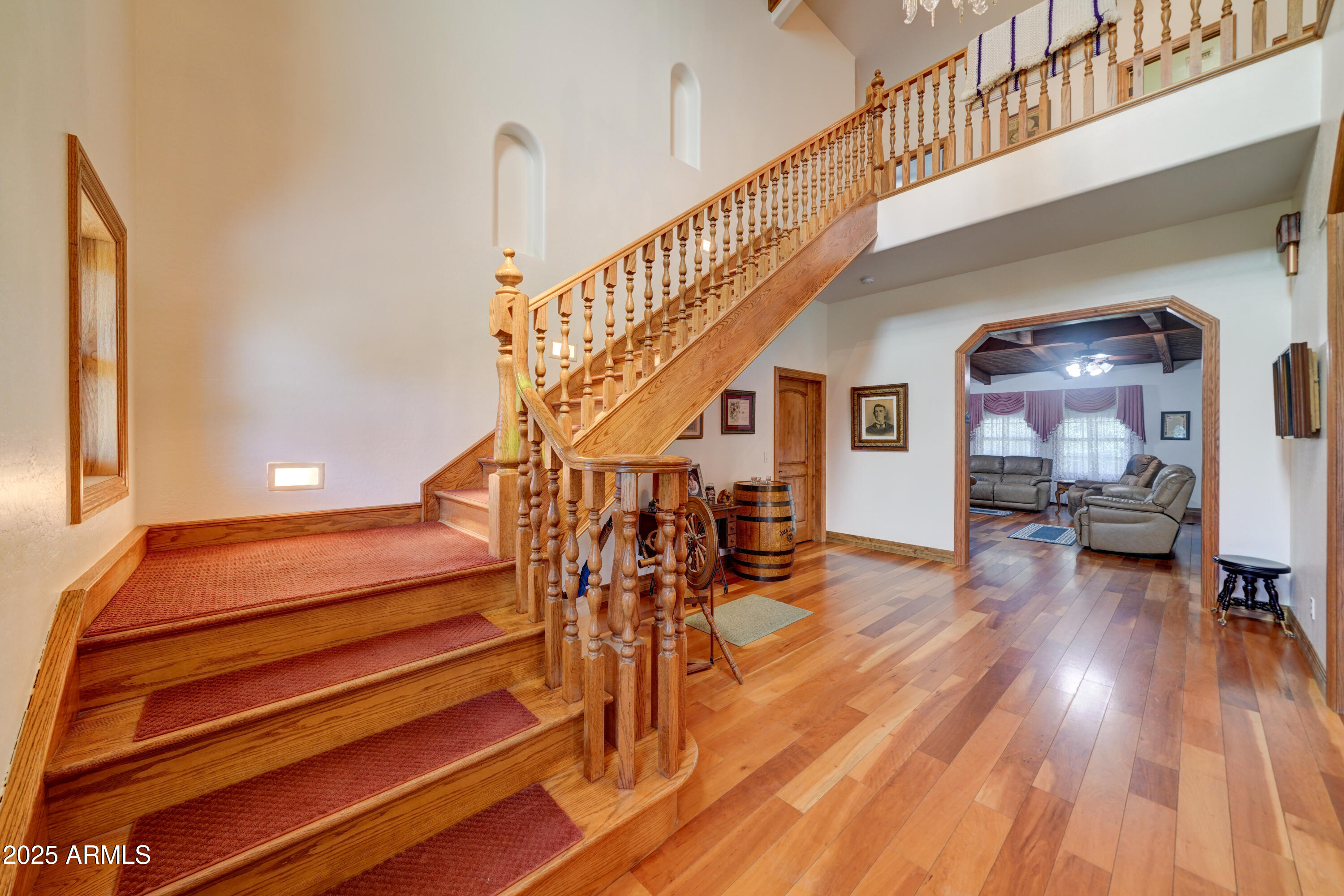 424 East Lehi Road Mesa, AZ 85203 - Photo 6 of 35 a view of entryway and hall with wooden floor
