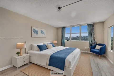 a bed room with a bed and a couch