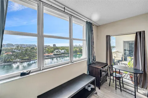 a room with furniture and a window