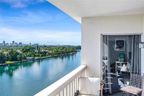 a view of a lake from a balcony