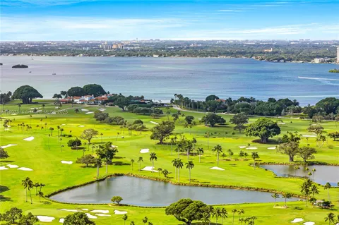 a view of a lake with a big yard