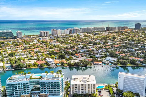 a view of a city and ocean