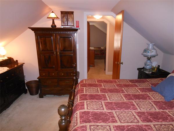 22 Marchioness Road Springfield, MA 01129 - Photo 16 of 27 a bedroom with a bed and cabinets