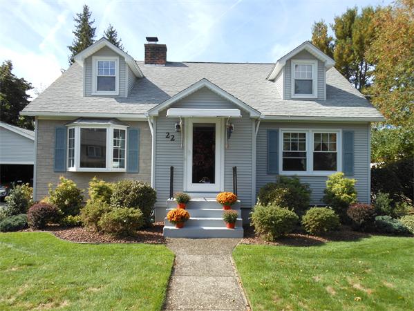 22 Marchioness Road Springfield, MA 01129 - Photo 2 of 27 a front view of a house with a yard and potted plants