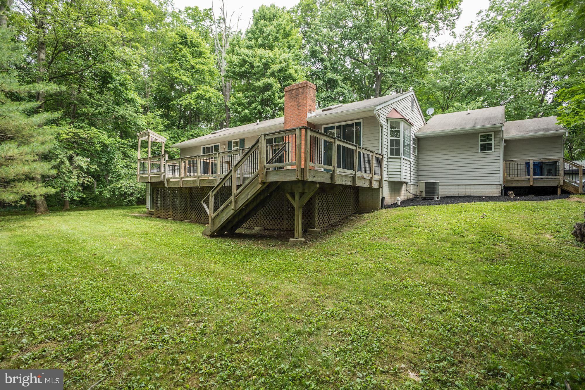 4747 Dave Rill Road Hampstead, MD 21074 - Photo 31 of 34 Private Backyard with Large Deck