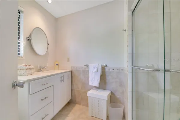 a bathroom with a shower and a toilet