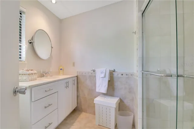 a bathroom with a shower and a toilet