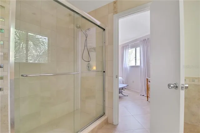 a view of a house with a tree