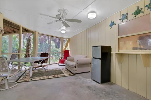 a view of hall way with furniture and entryway