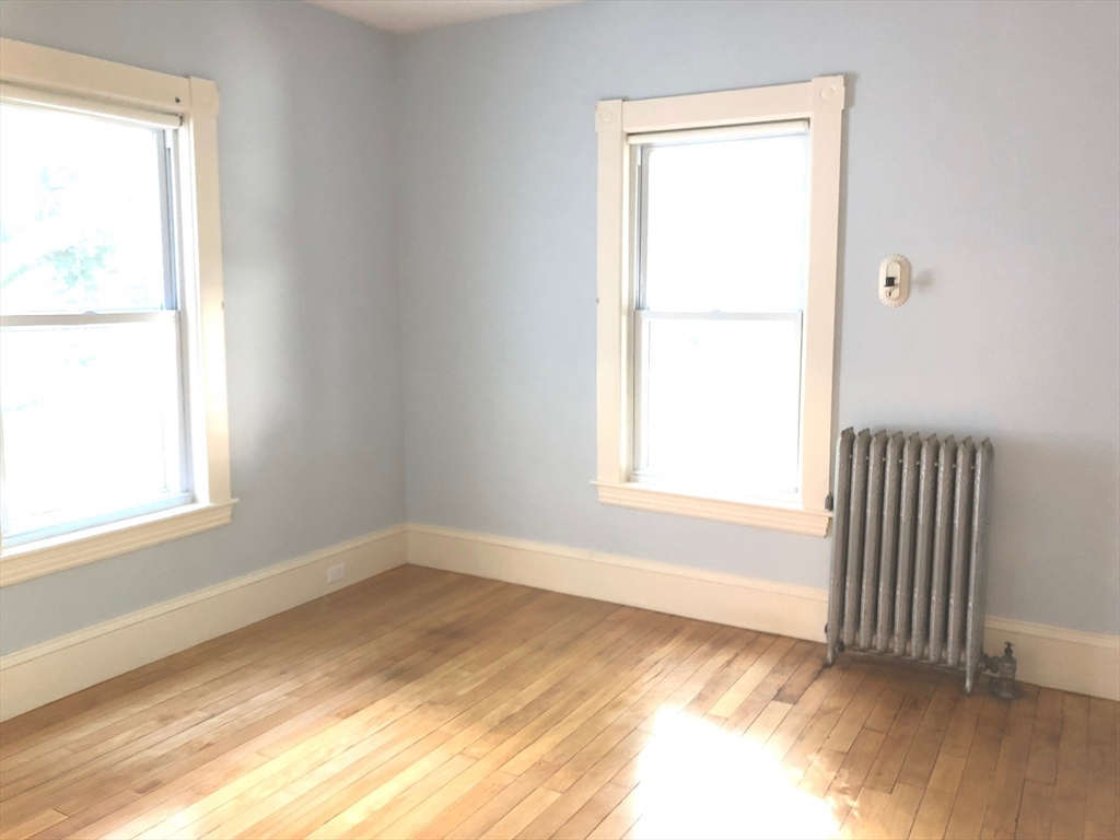 505 High Street, Unit 505 Lowell, MA 01852 - Photo 13 of 17 an empty room with a window