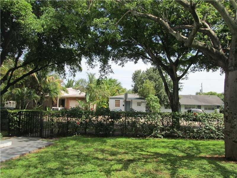 1925 Madison Street, Unit 4 Hollywood, FL 33020 - Photo 11 of 11 a view of a house with a garden