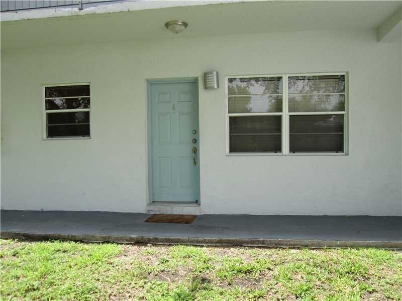 1925 Madison Street, Unit 4 Hollywood, FL 33020 - Photo 2 of 11 a view of a backyard of a house
