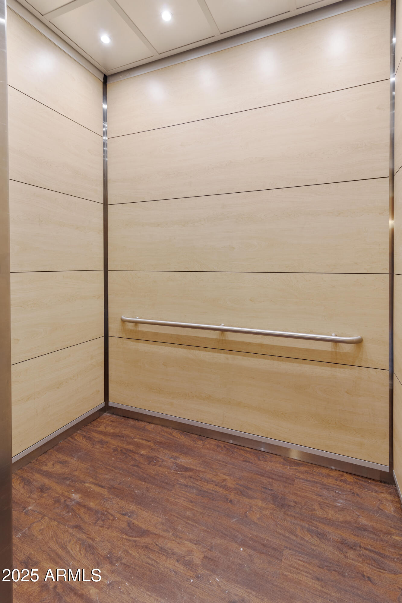 3033 East Devonshire Avenue, Unit 3003 Phoenix, AZ 85016 - Photo 30 of 45 a view of an empty walk in closet