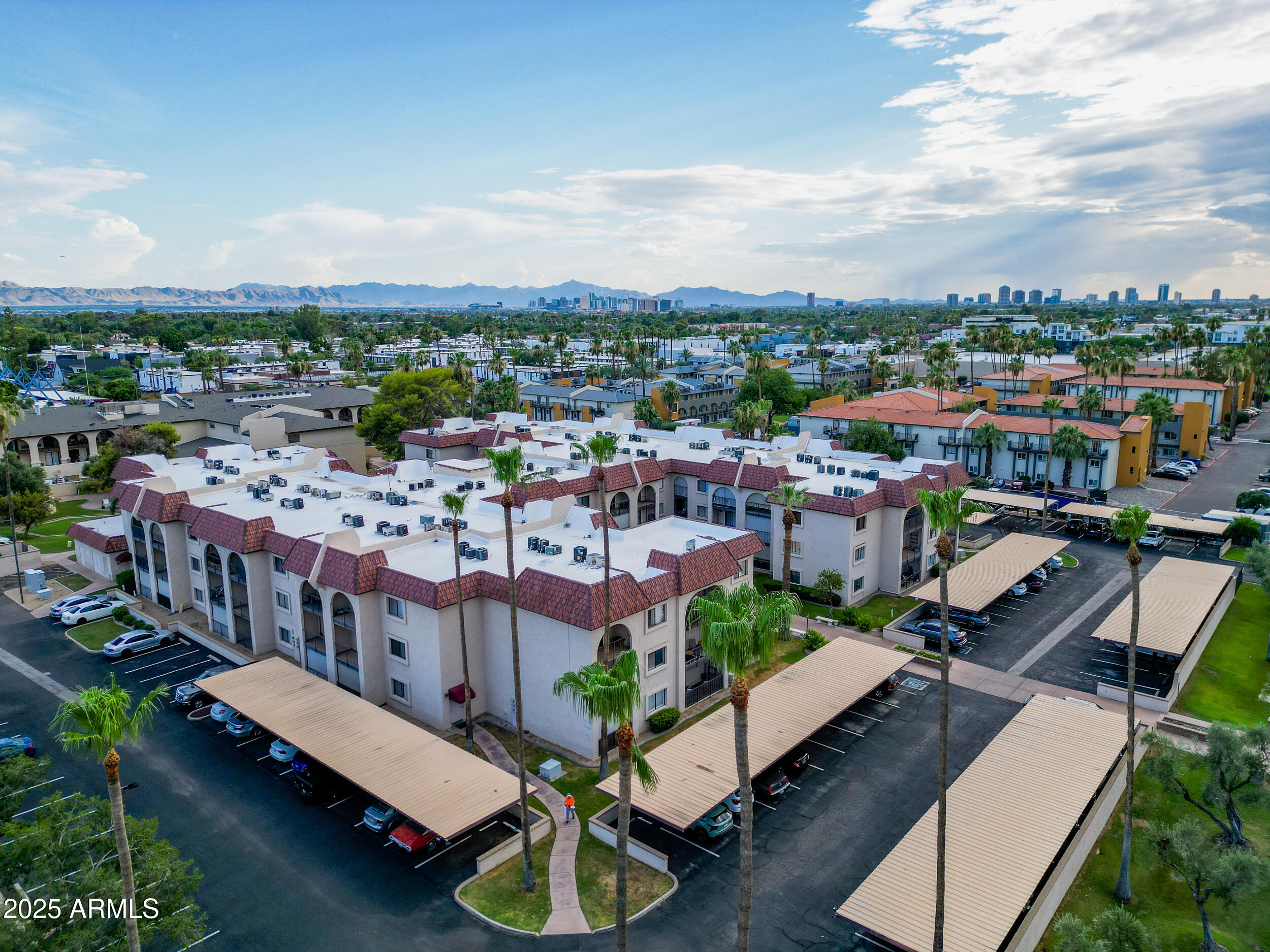 3033 East Devonshire Avenue, Unit 3003 Phoenix, AZ 85016 - Photo 41 of 45 an aerial view of a house with a yard basket ball court and outdoor seating