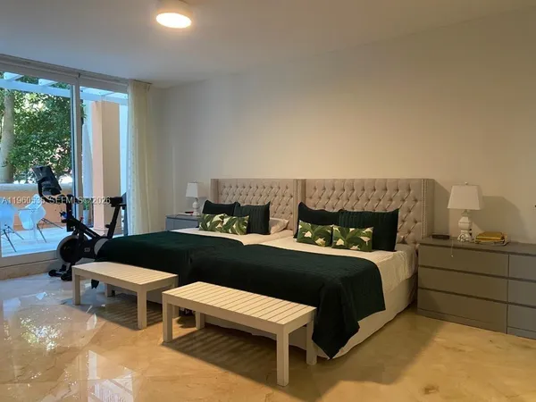 a room with a bed and a chair