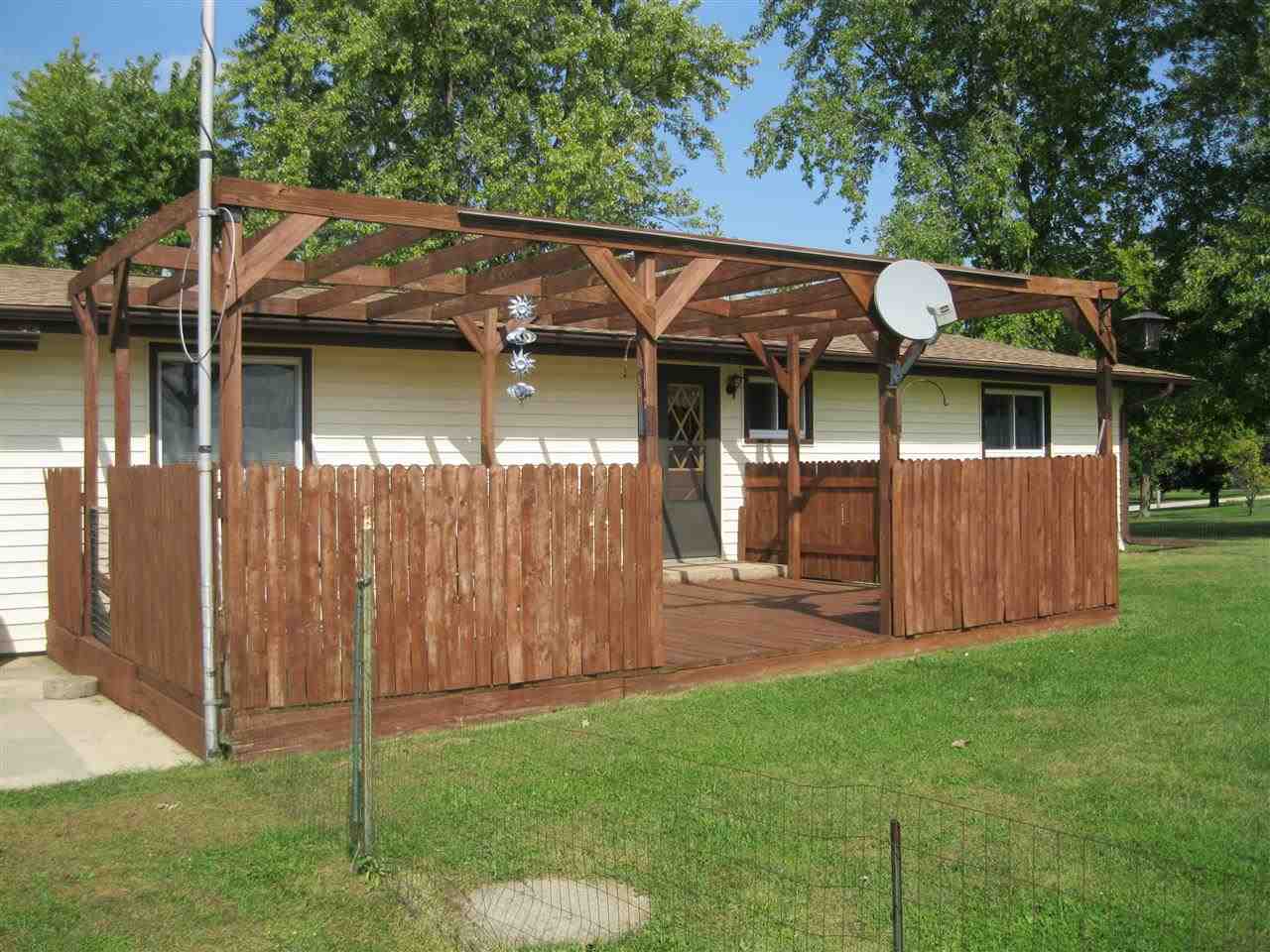 7114 Stephens Road Rockton, IL 61072 - Photo 16 of 20 a view of a house with backyard and sitting area