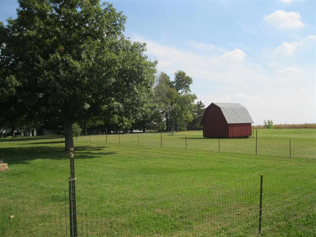 7114 Stephens Road Rockton, IL 61072 - Photo 18 of 20 a view of a big yard with a large trees