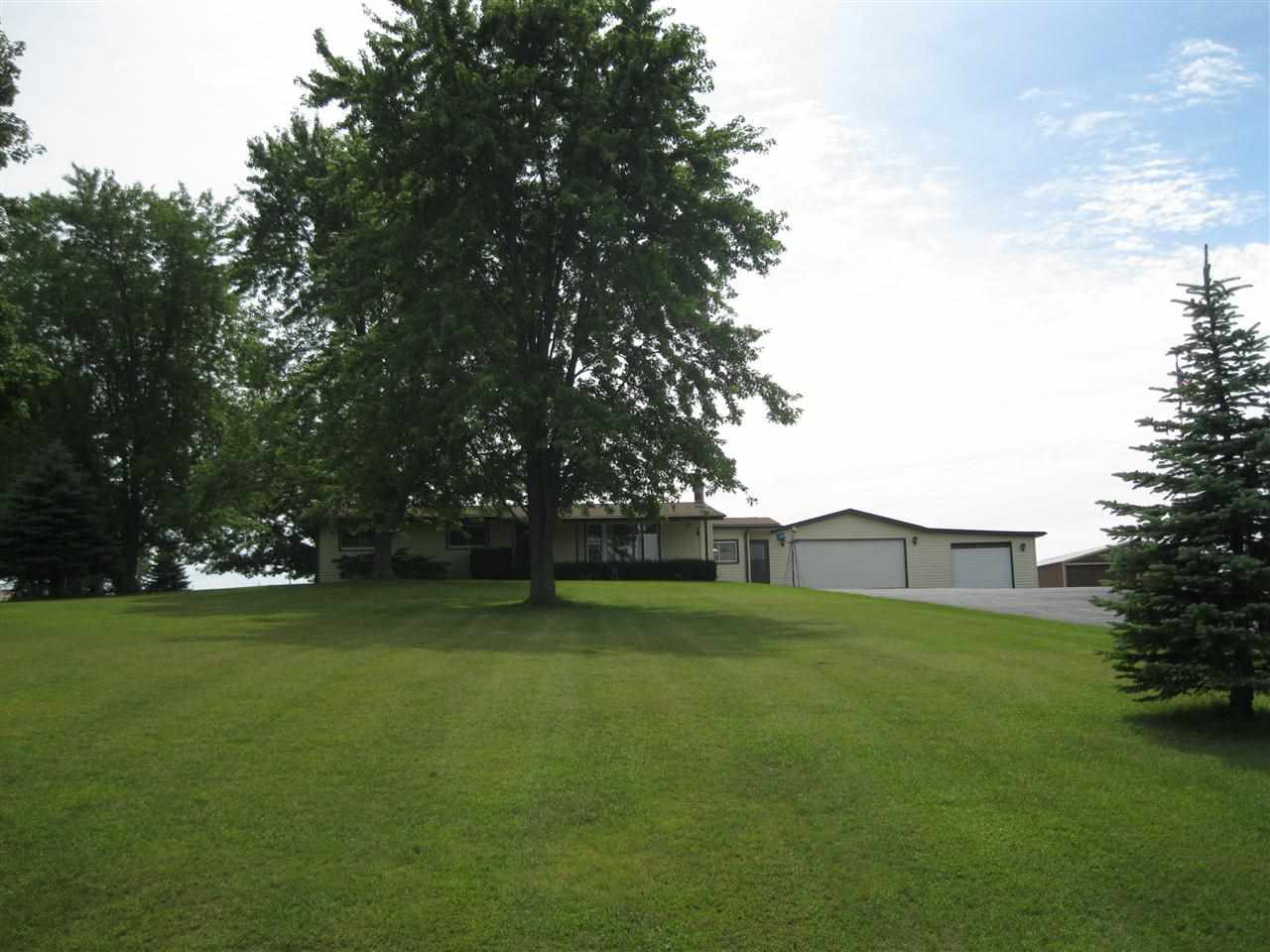 7114 Stephens Road Rockton, IL 61072 - Photo 19 of 20 a view of a field of grass and trees