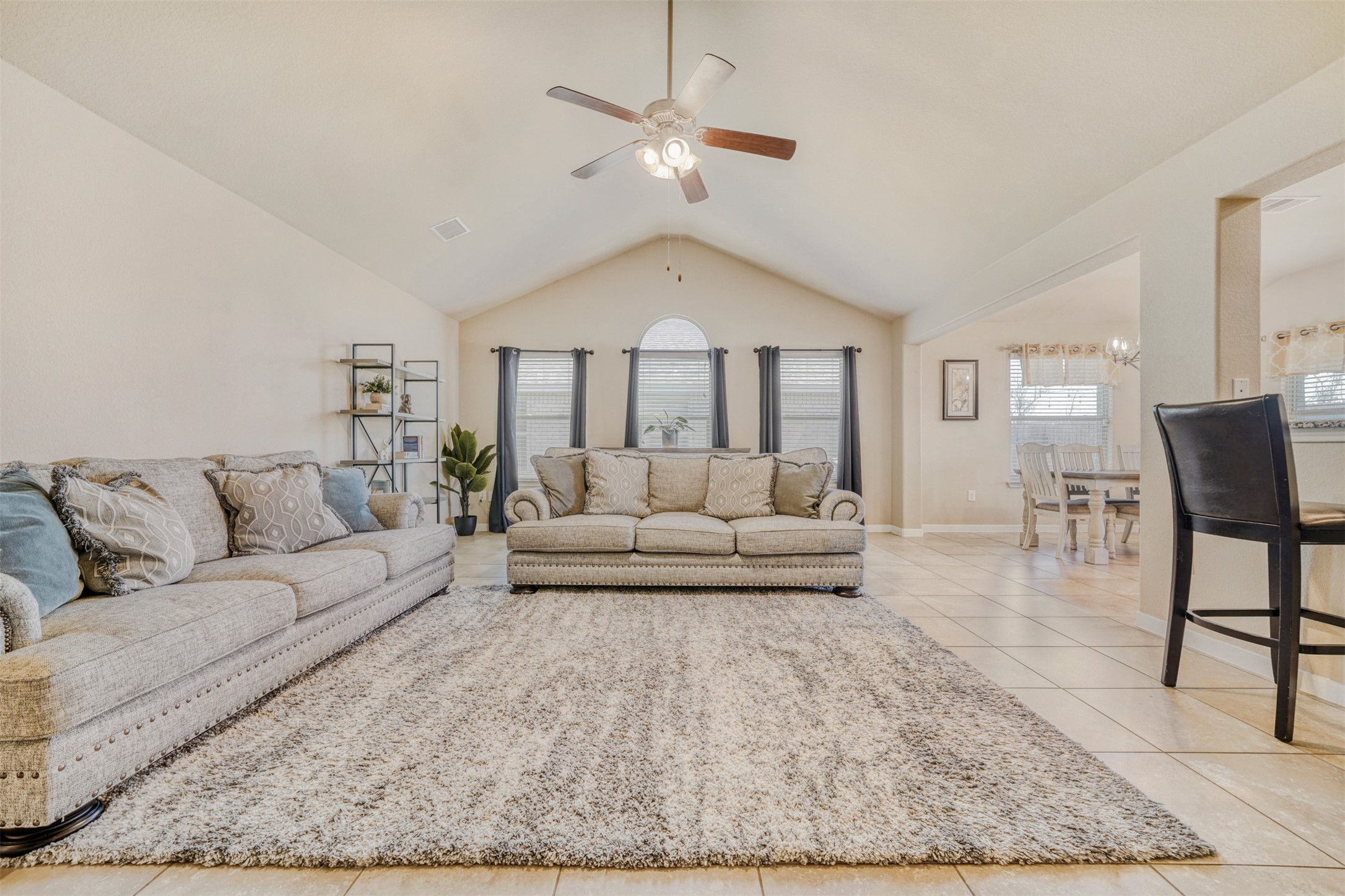 952 Palo Duro Loop Round Rock, TX 78664 - Photo 14 of 37 a living room with furniture and a chandelier