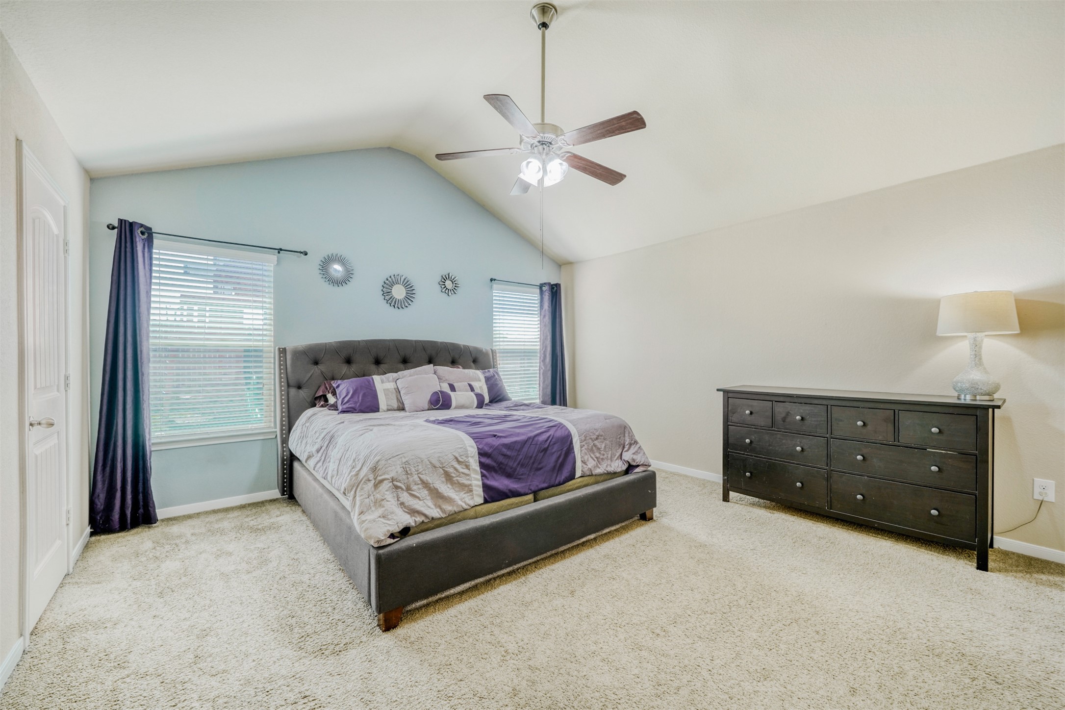 952 Palo Duro Loop Round Rock, TX 78664 - Photo 18 of 37 a spacious bedroom with a bed and a dresser
