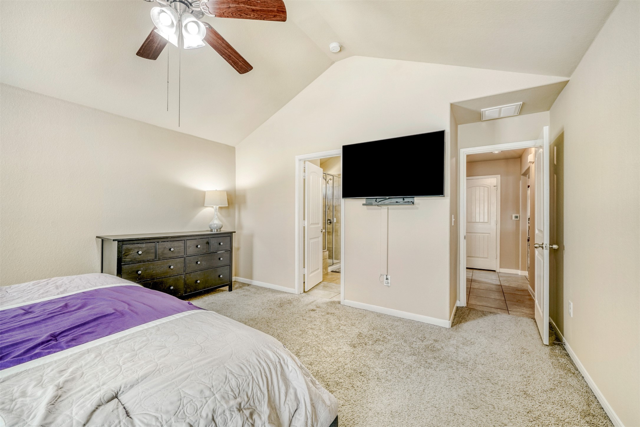 952 Palo Duro Loop Round Rock, TX 78664 - Photo 27 of 37 a bedroom with a bed and a flat screen tv