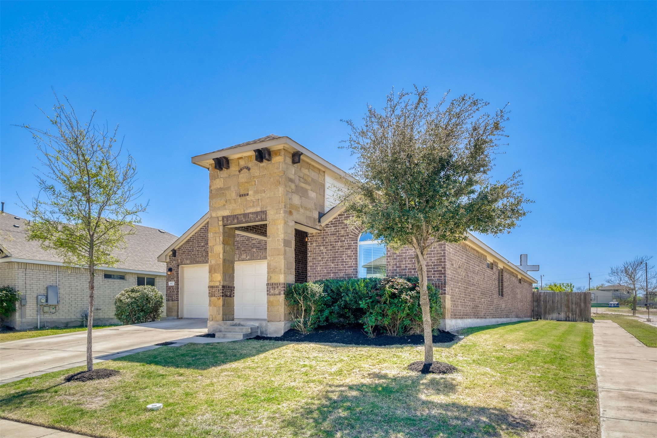 952 Palo Duro Loop Round Rock, TX 78664 - Photo 4 of 37 a front view of a house with a yard