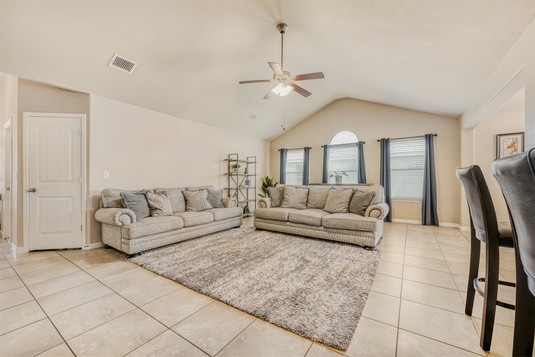 952 Palo Duro Loop Round Rock, TX 78664 - Photo 8 of 37 a living room with furniture and a chandelier