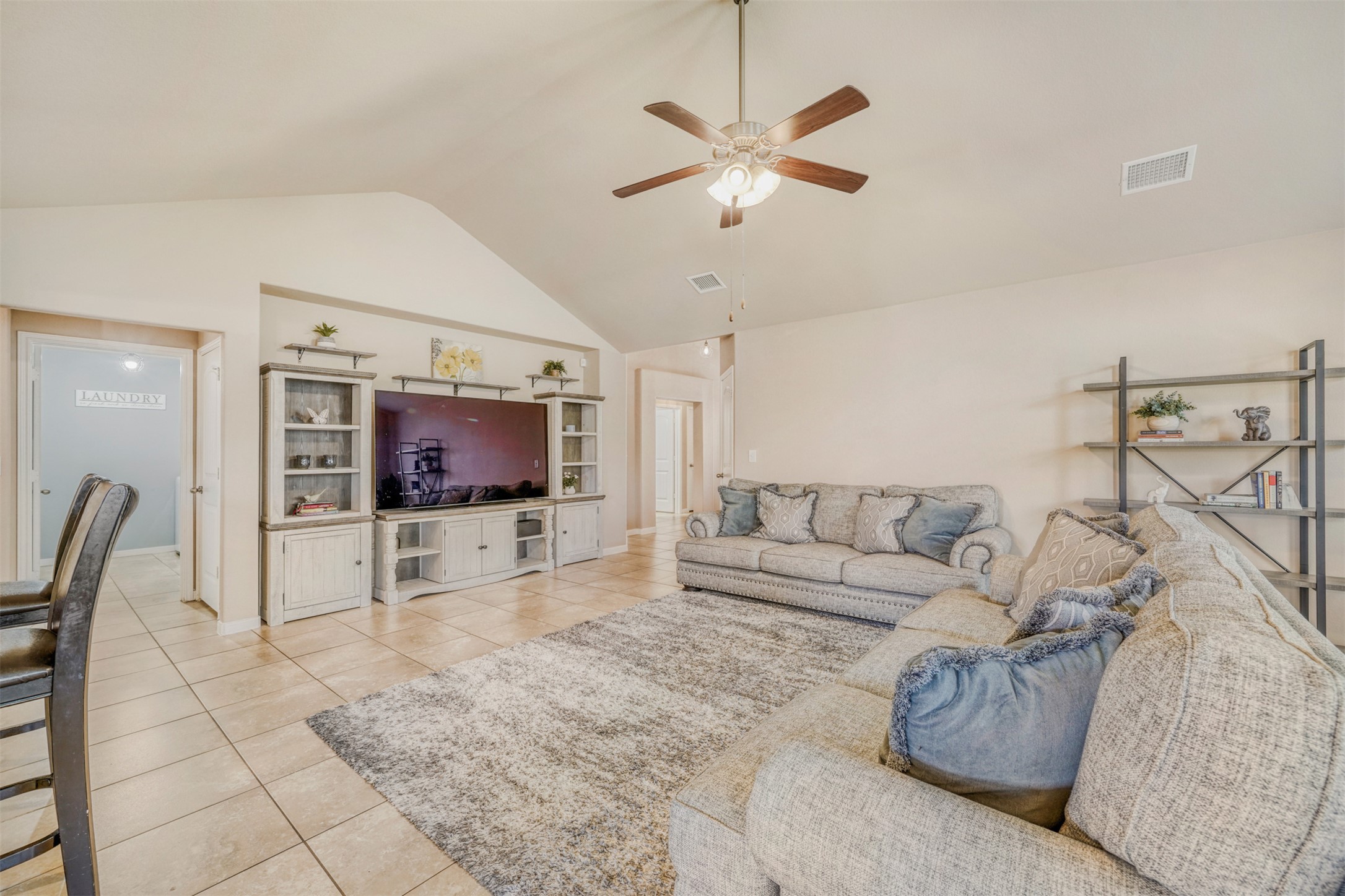 952 Palo Duro Loop Round Rock, TX 78664 - Photo 9 of 37 a living room with furniture and a flat screen tv