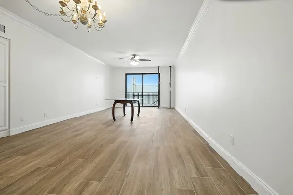 a view of a livingroom with wooden floor