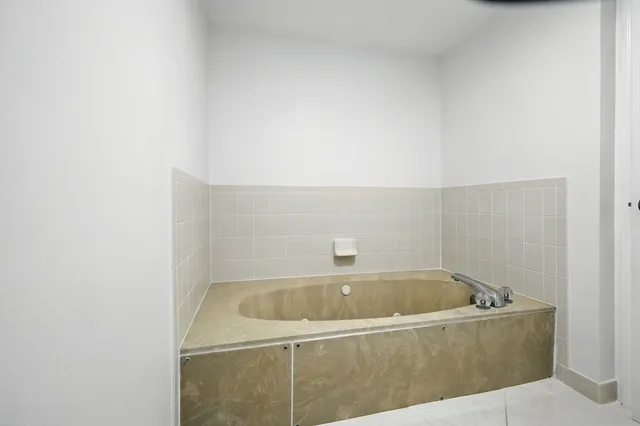 a bathroom with a bathtub