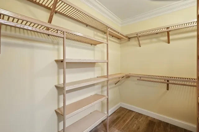 a view of a room with racks on the wall