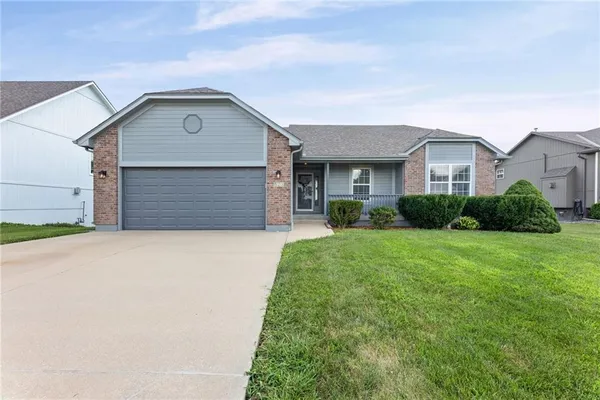 $350,000 | 523 Cedar Falls Court, Raymore, MO 64083