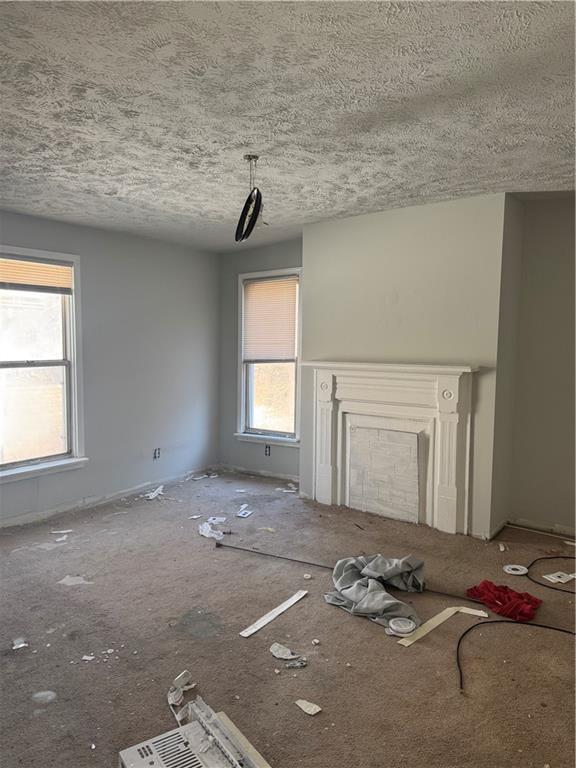 628 Church St Extension Turtle Creek, PA 15145 - Photo 11 of 12 a view of a livingroom with wooden floor and window