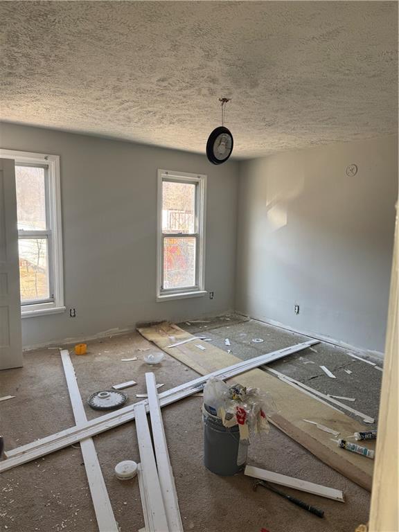 628 Church St Extension Turtle Creek, PA 15145 - Photo 12 of 12 a view of a livingroom with windows