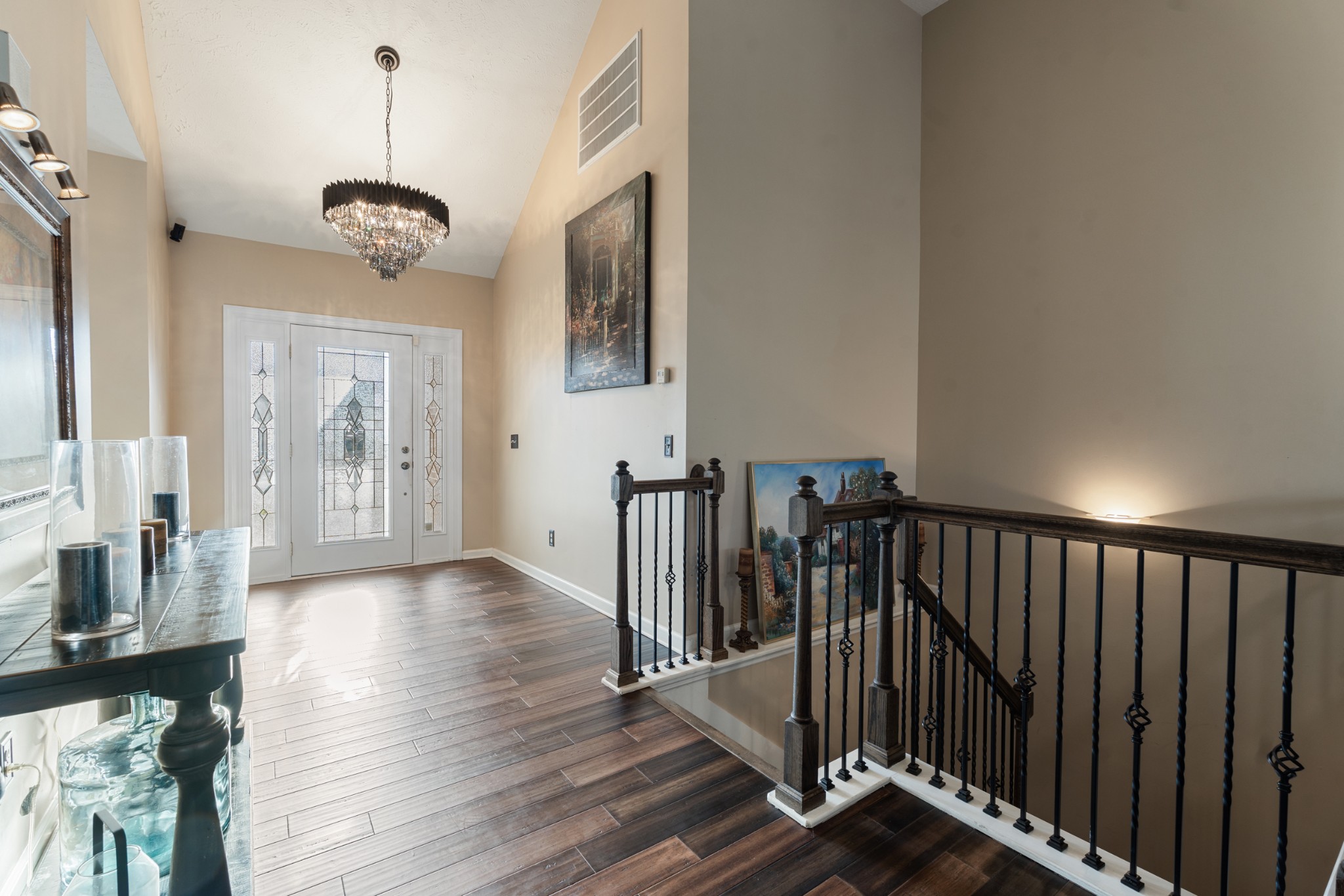 7105 Smokey Hill Road Antioch, TN 37013 - Photo 22 of 30 a view of a hallway with wooden floor and staircase