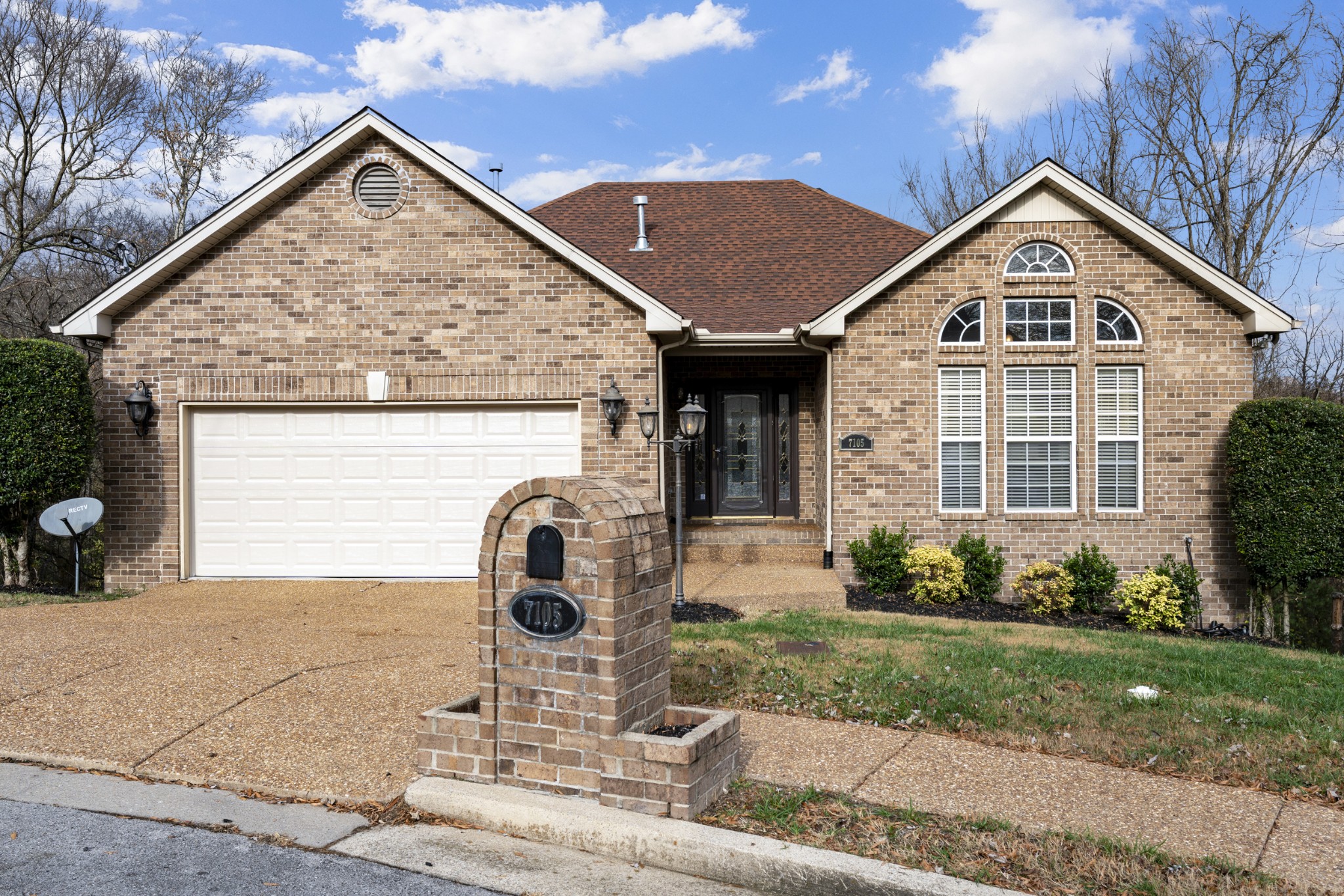 7105 Smokey Hill Road Antioch, TN 37013 - Photo 30 of 30 a front view of a house with garden