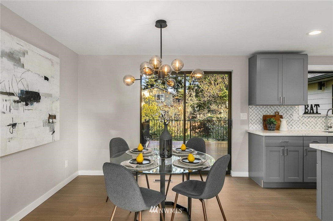 303 217th Place Southwest Bothell, WA 98021 - Photo 14 of 38 a view of a dining room with furniture window and outside view
