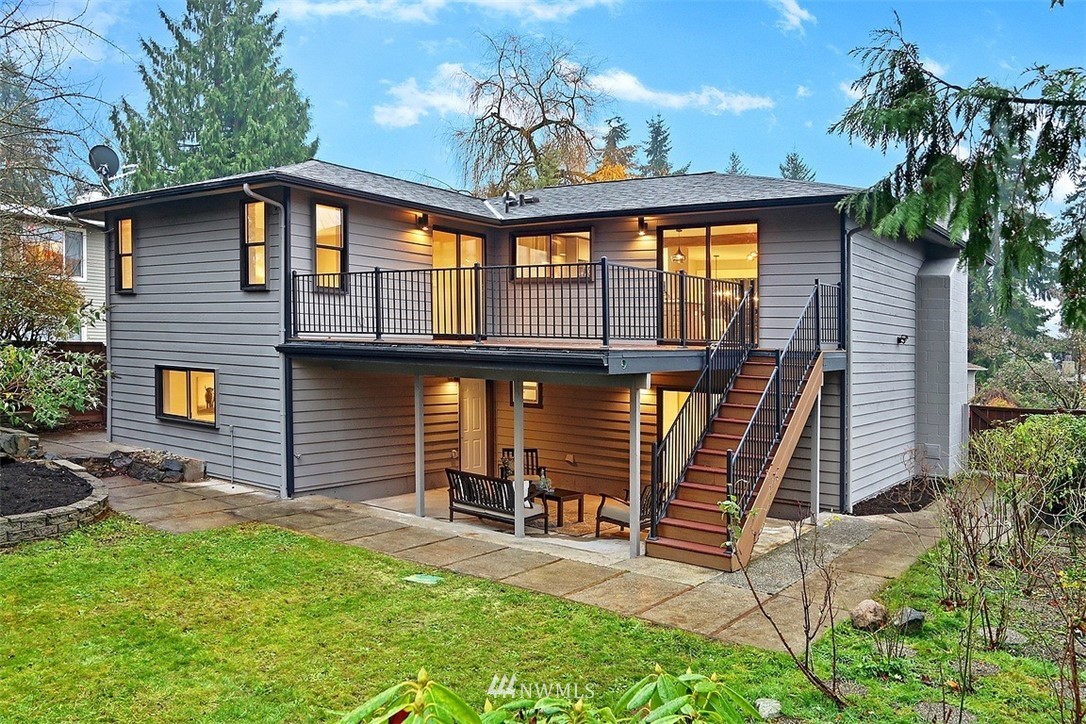 303 217th Place Southwest Bothell, WA 98021 - Photo 34 of 38 a front view of a house with garden
