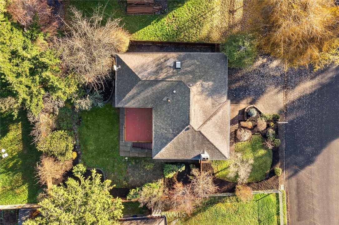303 217th Place Southwest Bothell, WA 98021 - Photo 35 of 38 a aerial view of a house with a yard