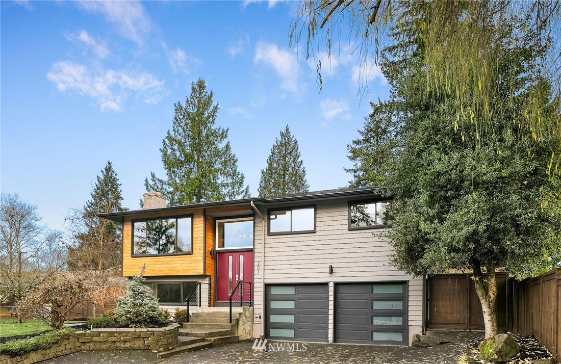 303 217th Place Southwest Bothell, WA 98021 - Photo 38 of 38 a front view of a house with a tree
