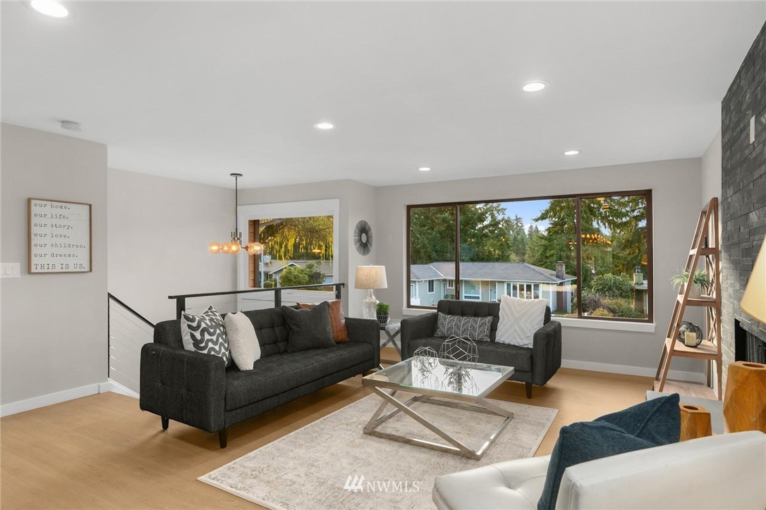 303 217th Place Southwest Bothell, WA 98021 - Photo 6 of 38 a living room with furniture and a large window