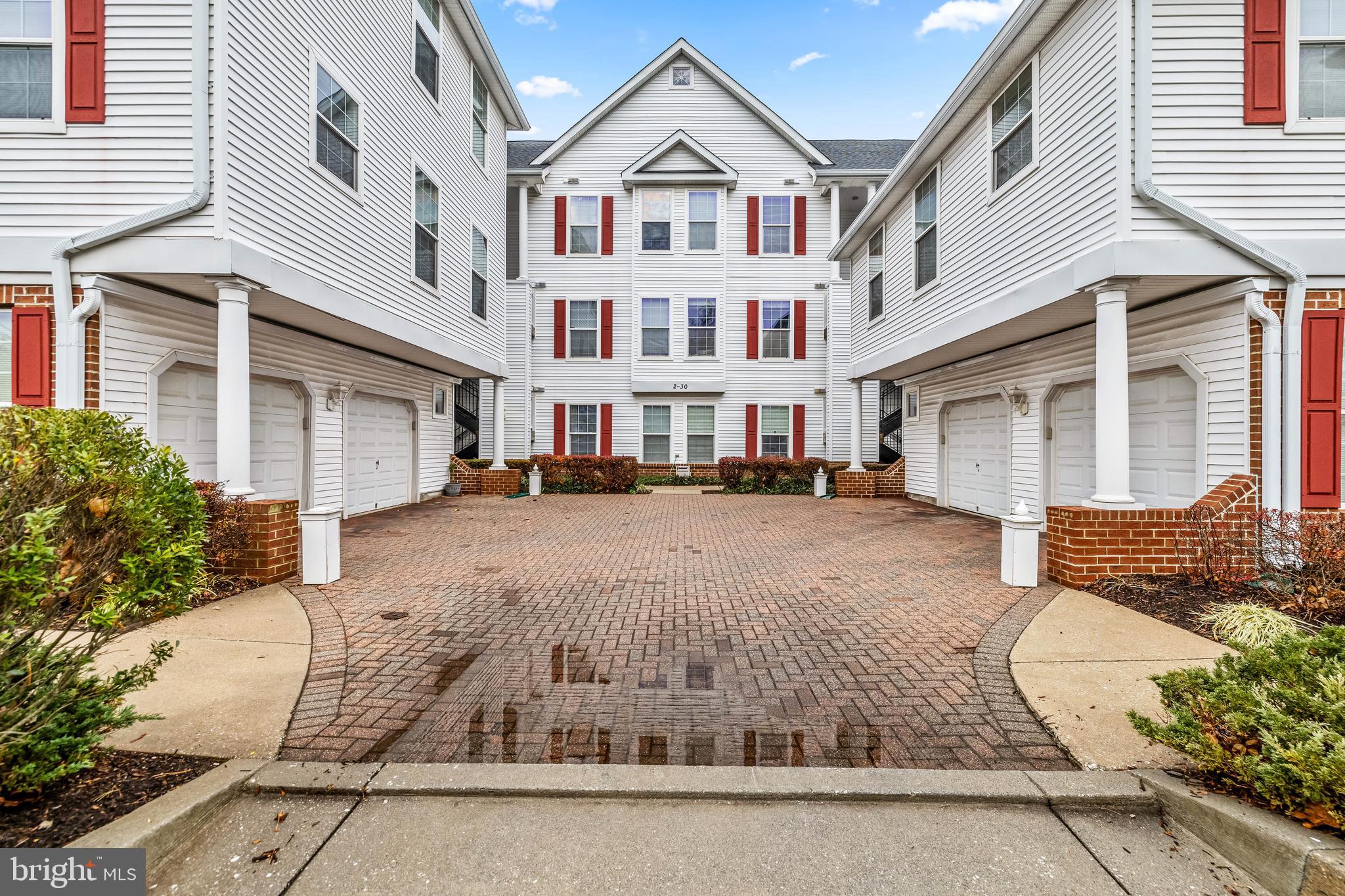 16 Hawk Rise Lane, Unit 204 Owings Mills, MD 21117 - Photo 3 of 33 a view of multiple houses with a street