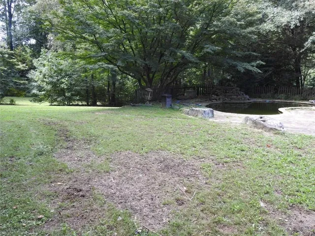 a view of a garden with a slide