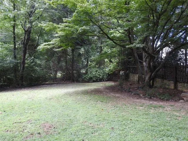 a view of an ocean and a yard