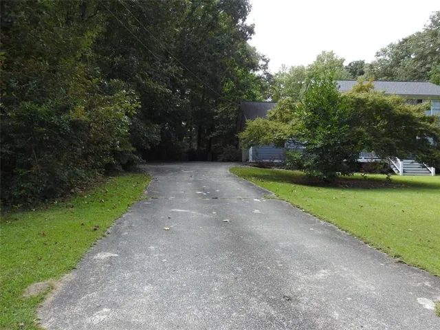 a view of backyard with green space