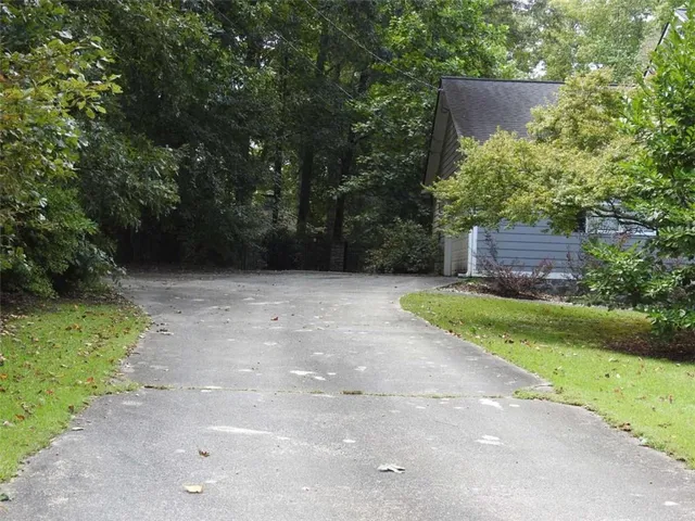 a view of backyard with green space